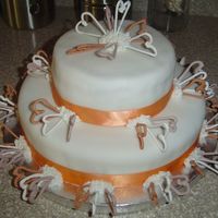 Wilton 3 Final Class The hearts are made out of royal icing and the cake is cover in fondant.