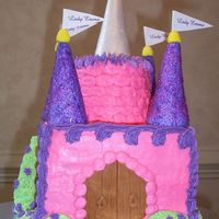 Pink , Purple And Silver Castle Cake Castle cake done for my best client, The Party Fairy! Pound cake squares with sugar cone turrets covered in fondant then brushed with...