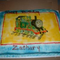 Thomas The Train This cake was made for my cousin's 3 year old. I took the design off of the invintation. The only mistake was I sprayed the background...