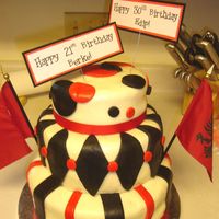 Red_Black__White_Cake_3.jpg For 2 guys birthday....