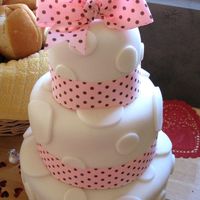 Baby Gilr Baby Shower This has become one of my most popular baby shower cakes. I made the bow on top and clipped it to a dowel to be used when the baby is older...