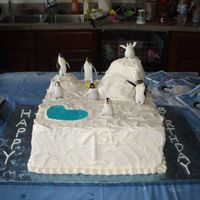 Happy Feet This was the cake for the guests to go along with Mumbles. It was two 12 inch square cakes stacked (one vanilla, one chocolate) and iced in...