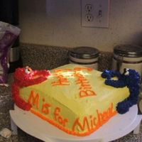 Elmo And Cookie Monster Here is another one of these cakes. This is my third time making this cake. I rushed this one so it dosen't look very good but I...