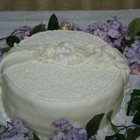 Wedding Shower This cake turned out to be a nightmare. I was very disaapointed in the cake and didn't have time to remake it. The MMF was too...