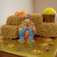 Fall Pralines and Cream flavored cake with Pralines and Cream icing. Everything is edible. The large pumpkin is an apple covered in fondant to...