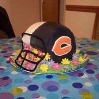 Bears/colts Super Bowl Cake I made this helmet cake for a Super Bowl party I went to. Devils food cake, carved to helmet shape, iced in buttercream, royal flowers. I&#...