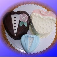Bride Groom And Baby Bridal shower cakes for a couple with a 6 month old baby that I wanted to include as well. The bride loved it.