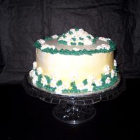 Ring Of Daisies inspired by a candle. I was going to do something totally different then I saw a candle and thought it would make a nice cake design.