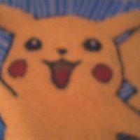 Pikachu Face I did this cake of pikachu for my son birthday it came out nice but it came out blurry in the computer. sorry for that.