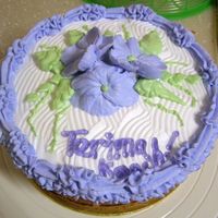 Thank You buttercake decorated with non-dairy whipped topping. made a mistake withspace estimation so the phrase "terima kasih" (thank you...