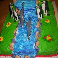 Go Diego Go This was a 11 x 15 sheet cake with a 8" round and a 6" round yellow cake w/buttercream icing and royal icing sugar animals. This...
