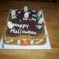 Halloween Cemetery This was for my son's 5th grade Halloween party. Yellow cake w/buttercream icing. The worms were sour gummy worms, the ghosts were...