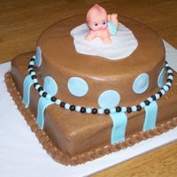 Baby Shower yellow cake, with buttercream icing and fonant accents