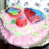 Sophie's First Fondant Cake- Age 4 Sophie, who is 4, made all the fondant decorations all by herself. I made the white cake and buttercream frosting from scratch. She had so...