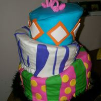 Becca's Sweet 16 Bday Cake My first Topsy Turvy! Wow, that was a lot of work!! I will do MANY things differently next time! Top tier is white sour cream with rasp...