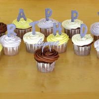 Birthday Cupcakes Four different flavors of cupcakes - chocolate w/peanutbutter filling & chocolate ganache frosting, vanilla w/lemon curd filling &...