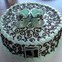 Baby Shower Just a simple buttercream design with fondant shoes for a baby shower for Baby "J"