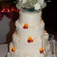 Chris & Jessica Wedding Cake This is my first real wedding cake that I made for my nephew and his wife's wedding. Yellow cake with french buttercream frosting