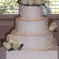 Mississippi Wedding white almond cake with raspberry fill. all buttercream with fresh flowers