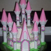 Castle Cake for a 2yr old, mom bought the wilton castle cake kit and asked me to make it for her.