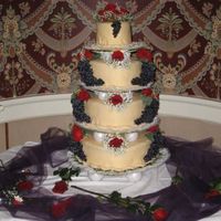 Wedding Cake - October 2007! The Bride requested Grapes & Red flowers, which were both of her wedding day colors. She also requested Heart shaped cakes with Fondant...