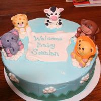 My First Baby Shower Cake I got this idea from a Wilton picture, but I freehanded the fondant animals. This is only my third cake ever, but the mom-to-be loved it!