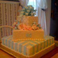 Pink And Blue 50Th Wedding Anniversary This is a 16" WASC, 11" Chocolate, and 6" WASC - my largest cake to date. Cake is covered in buttercream with fondant...