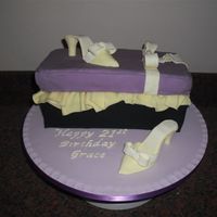 Grace's Shoe Cake Belgian Chocolate Fudge Cake with Chocolate Buttercream, covered in Fondant. Pastillage Shoes and Lettering