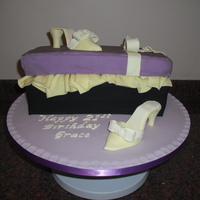 The Shoebox And Shoe Chocolate Biscuit Cake with Rice Krispie Box Lid, covered in fondant with Pastillage Shoe