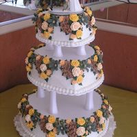 3-Tier Heart Shaped Wedding Cake W/royal Icing Flowers This cake was made for our contractor who is very earthy. It's a combination of his flair for fishing and camping and her feminity, so...