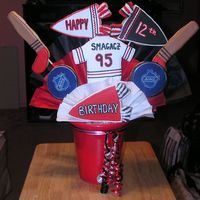 Hockey Birthdy Cookie Bouquet Birthday Cookie Bouquet for a Boy's Birthday. All of the templates were made from clipart. They pictures were enlarged and cut out of...