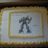 Grandson's 5Th Birthday Cake My grandson requested Transformer (Bumblebee) on his 5th birthday cake. I had worked 4 twelve hour shifts and found an edible image he...