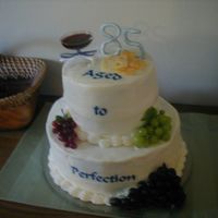 Adult Male Birthday 10" and 6" tiered Birthday cake. with WASC and Chocolate Almond Sour Cream Cake. Buttercream icing.. The 85 is gumpaste.. The...