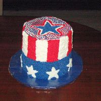 Uncle Sam's Hat 4 layer 8 inch cake. Top half chocolate bottom half white cake. This was a fun cake to do desite the worst humidity ever.