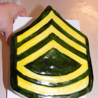 Sfc Promotion Cake For My Husband 9x13 WASC cake, cut in half, stacked, carved, buttercreamed, and covered with homemade MMF. The rank is hand painted with gel/vodka mix....