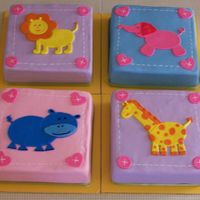 Baby Shower Cake This cake was a nightmare! The cakes kept cracking when I torted them. The fondant was too soft and showed every bump. crease. I couldn&#...