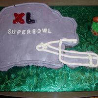 Footbal Helmet?? Vanill CCC with IMB icing and piping gel writing. Got the idea from a recent issue of American Cake Decorating magazine . There's...