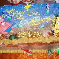 Under The Sea !/4 sheet cake that's 1/2 chocolate and 1/2 yellow with fresh strawberries. IMBC. Airbrushed the undersea theme. Plastic fish and...