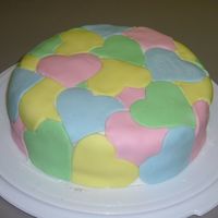 Valentines Day Fondant hearts. Devils food cake. This was fun to learn to do!