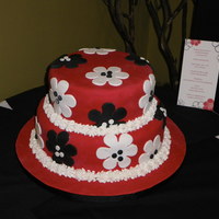 Flower Bridal Shower Cake Bridal shower cake for a friend. Bottom tier is WASC with strawberry filling and top tier is chocolate cake filled with chocolate ganache....