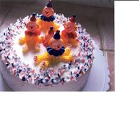 Clown Yellow cake with butter cream icing, with butter cream roses. I was very pleased with the out come of this cake. It was the second cake on...