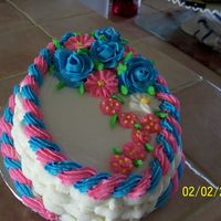 Roy_Final_Cake_002.jpg I done this cake to welcome a new baby boy, also put pink on it so little sister would not get jealous
