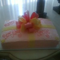 Bowcake Ii White cake w/strawberry swirls,Whipped icing and filling, fondant bow