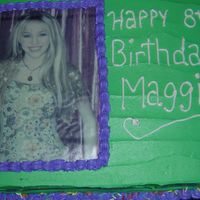 1May_2007_01111111.jpg I made this cake for a friends daughter. The theme of the party was Hannah Montana and she couldn't find a cake. So I did the best I...