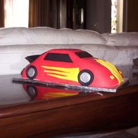 Race Car Cake I actually made this cake for the 1st place winner at a Pinewood Derby race. I used the wilton car pan for the cake.