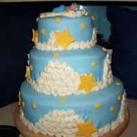 Sleeping In The Clouds 3 tiered 12", 9", 6". Butter almond with buttercream icing, devils food with raspberry cream filling, strawbeery with...
