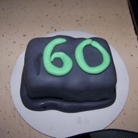 Small Cake Small cake for 60th birthday. Went with the golf ball.