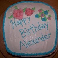 Happy Birthday White chocolate buttermilk cake covered with buttercream icing.