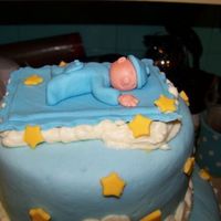 Close Up Of Sleeping In The Clouds Made from fondant with gumtex added.