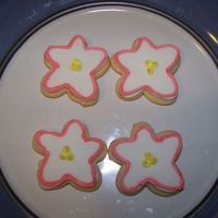 Flowers Sugar cookies covered with MMF and finished off with royal icing.